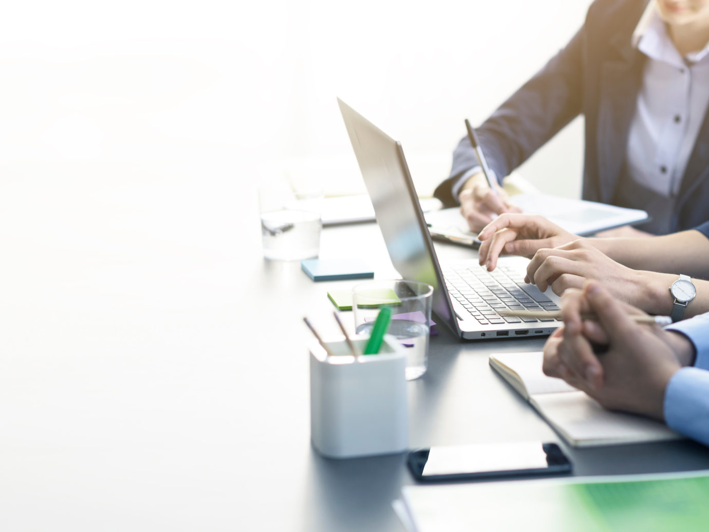 Professional business team working together at desk