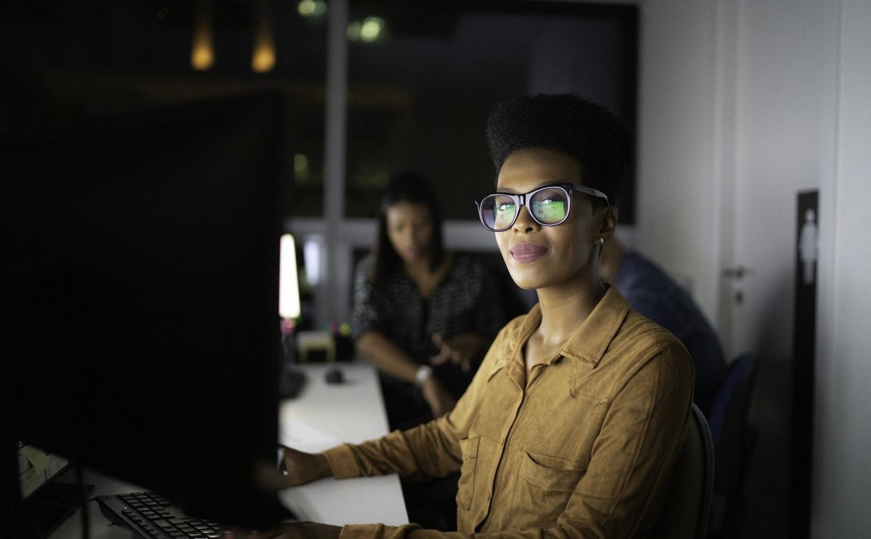 Portrait of businesswoman working late in the office