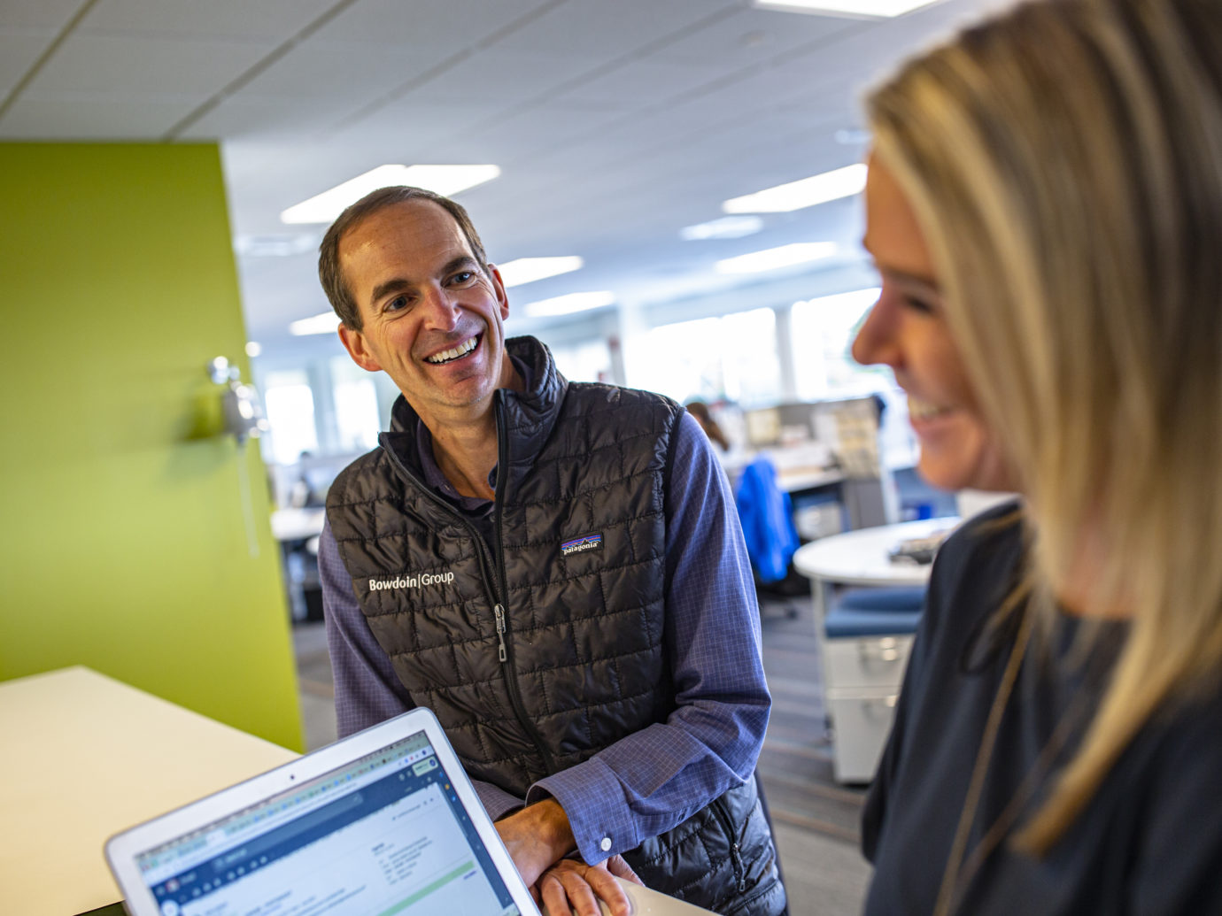 Two smiling Bowdoin team members